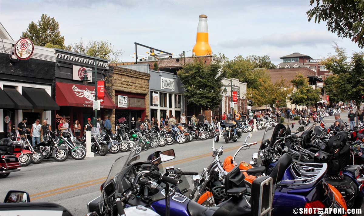 Motorcycles parked along Dickson Street during the Bikes, Blues, and BBQ Rally